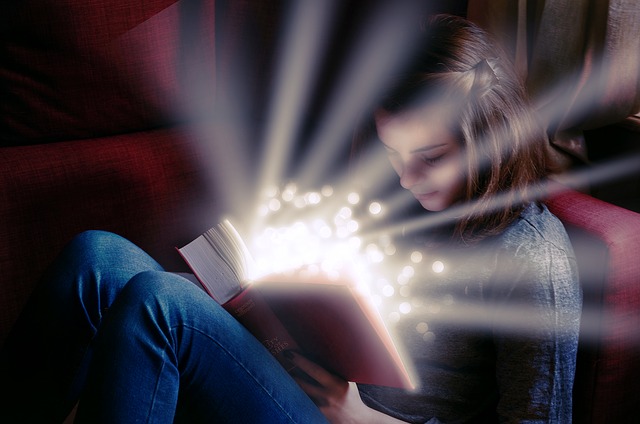 teenage girl reading a book