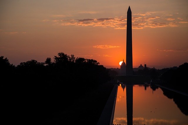 the washington monument at sunset