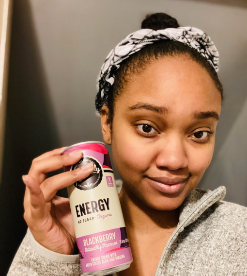 Briana Booker, Chief Editor of Fromgirltogirl.com Drinks Remedy Good Energy Blackberry for a caffeine boost. 